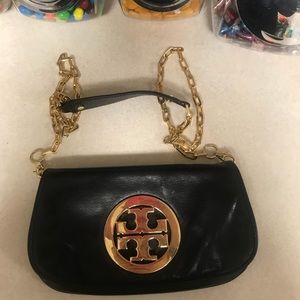 Tory burch clutch with gold emblem
